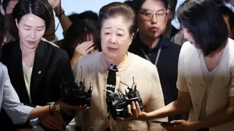 Disputed Religious Head Denies Bribery Accusations Involving Ex-South Korea President's Wife