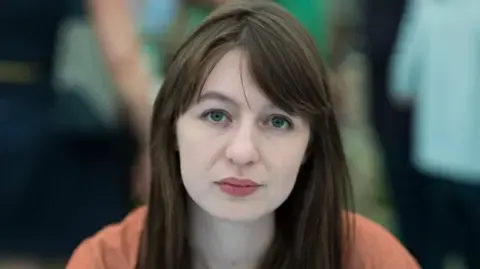 The acclaimed novelist claims she cannot enter the UK over legal concerns